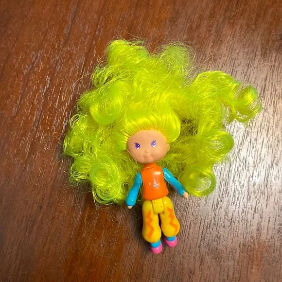 Adorable little girl doll with a lot of hair - Picture 1 of 3